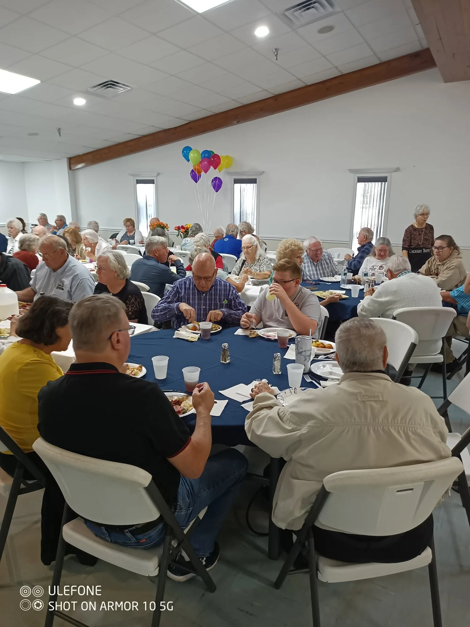 Calvary members sharing food and fellowship