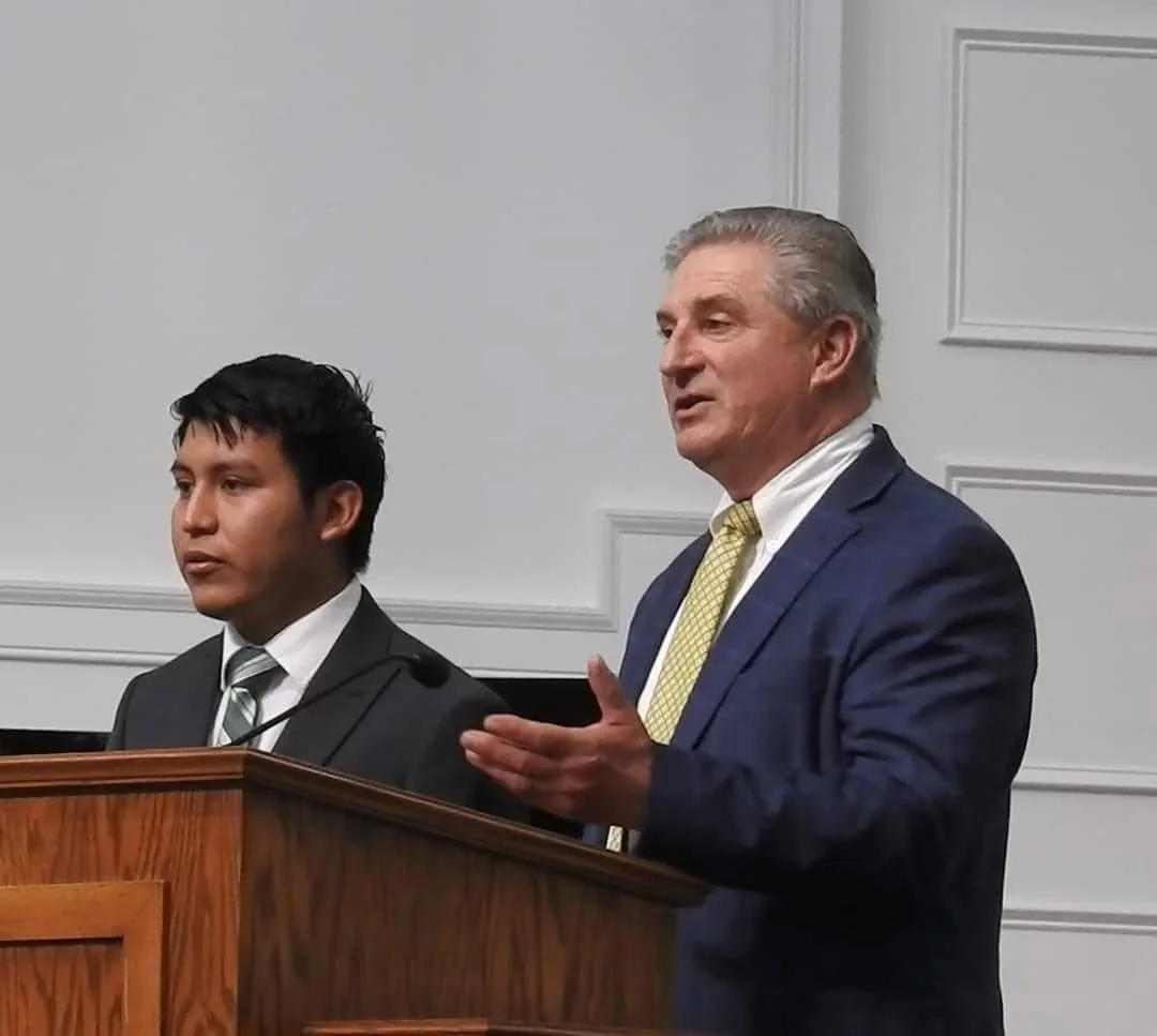 Pastor Kenneth Dembeck serving alongside Mateo Manuel